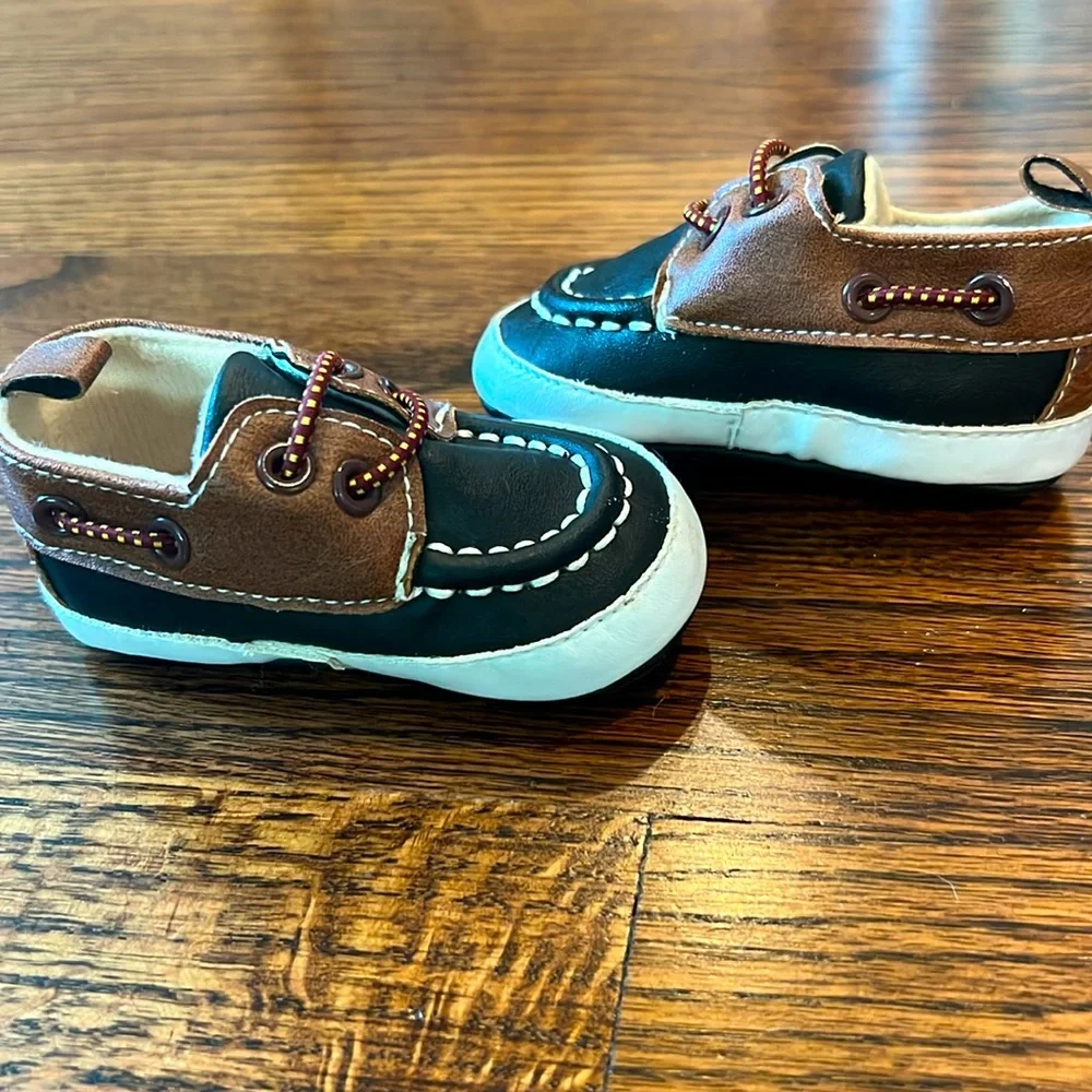 Rising Star Black and Tan Baby Moccasins